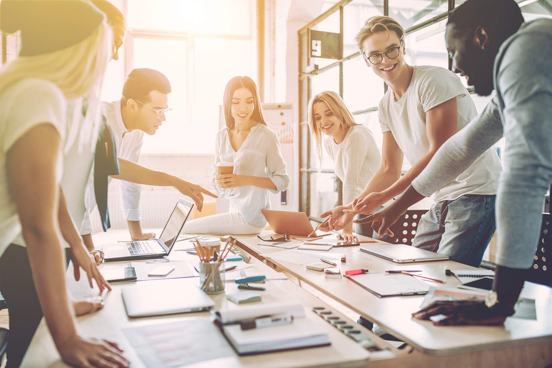 Young people work in modern office